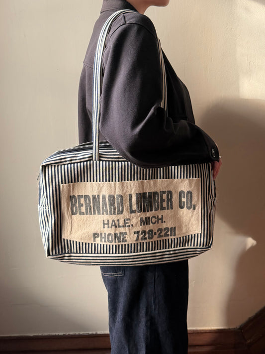 Lumber Co Striped Bowler Bag